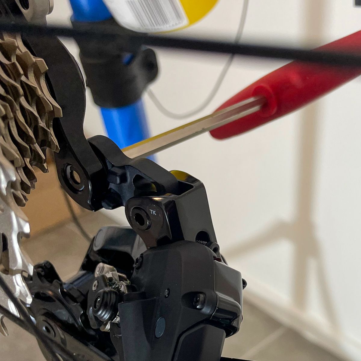 The backside of the derailleur showing the b-tension stop